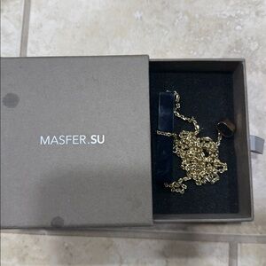 Elegant Gold and Black Necklace